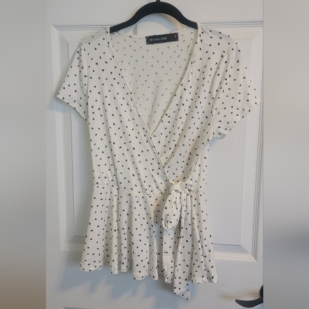 The Flying Crane peplum top. Medium